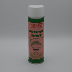 A can of Walter's Interior Shine with a pink label, green top and bottom bands, and a white cap, photographed against a neutral gray background.